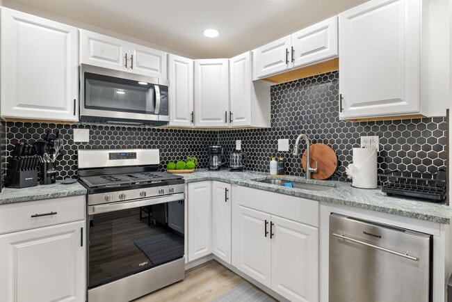Kitchen with Stove and Microwave - 10 Carrie St