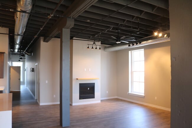 Living Room with Electric Fireplace - 628 Washington St Unit 3rd Floor