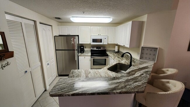 Photo - 5090 Fairways Cir Unit H202