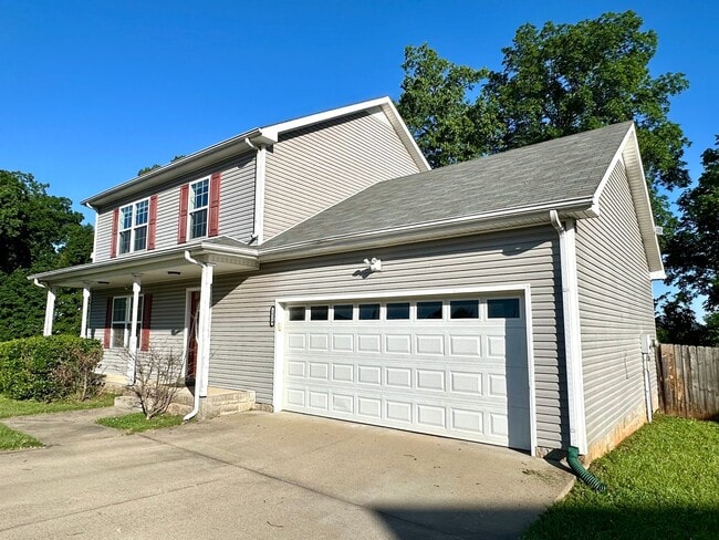 Photo - Spacious 3-Bedroom Home with Fenced Yard & Garage!