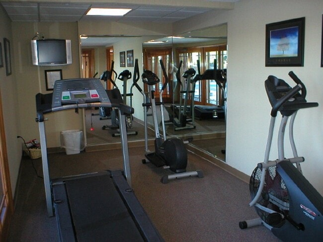 Stay active with a variety of workout options at Cedar Ridge Apartments' fitness center.