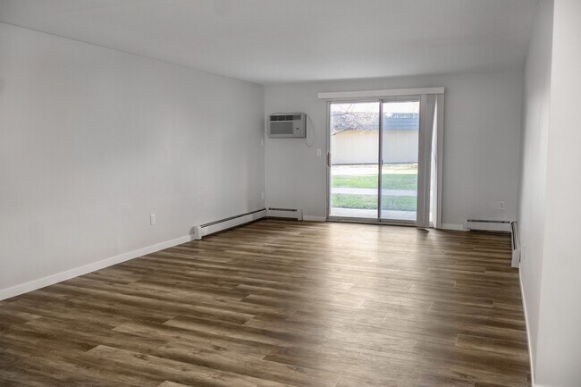 Unveil the spacious elegance of The Gallery with stunning hardwood floors and abundant natural light. This inviting living space seamlessly connects to outdoor tranquility. Ready to elevate your lifestyle? Schedule a tour today!