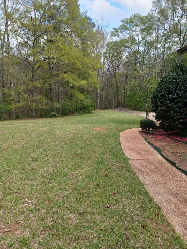 Photo - Charming 4BR/2.5BA Retreat on 2 Acres-Available Now!