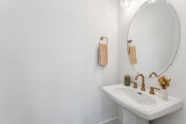 Photo - High-End 2BR Townhome | Rooftop Terrace + 2-Car Garage | 24-Unit Community