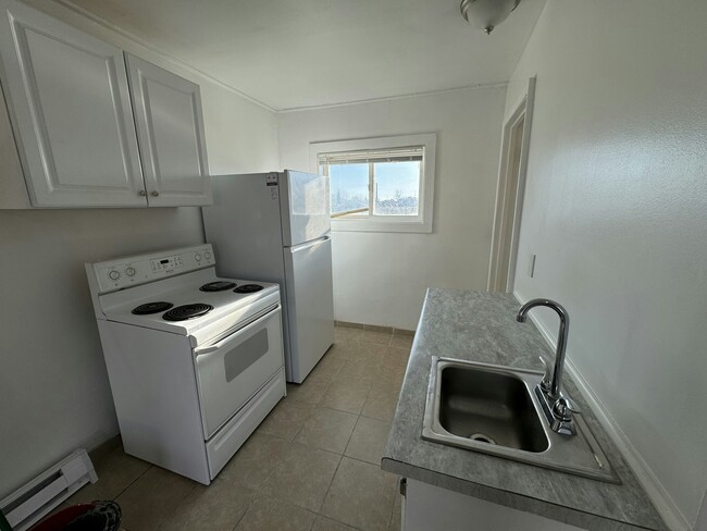 Building Photo - 4278 Grape Dr NE Unit 1B