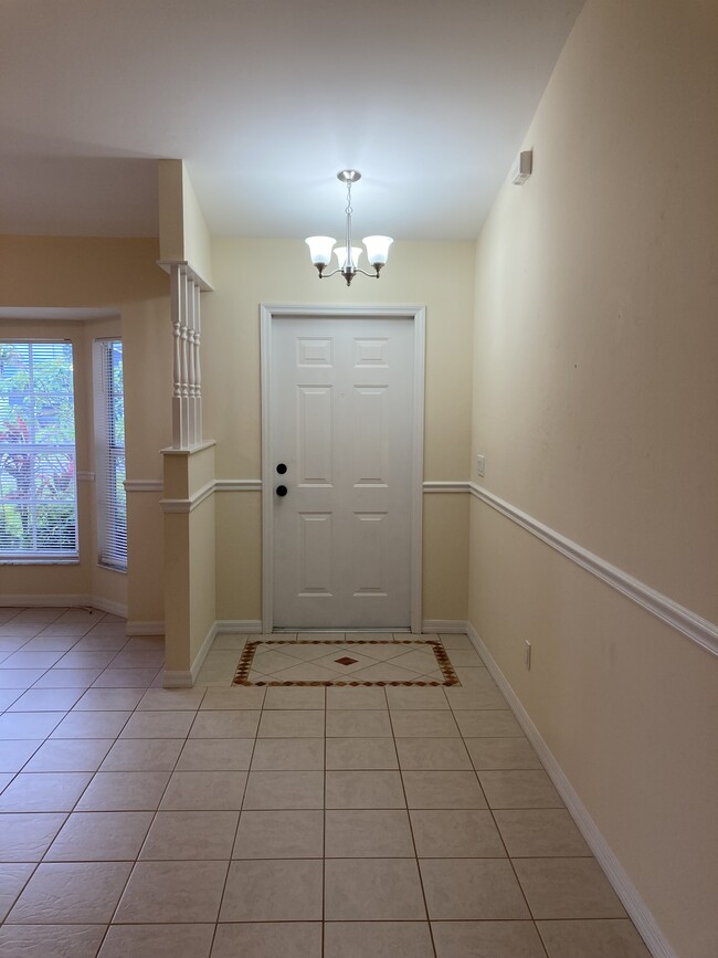 Interior front entryway with decorative tile - 3224 SW 7th Pl Unit Duplex-3224 SW 7th Pl