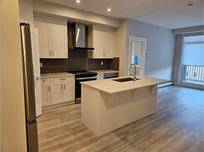 Photo - Come enjoy the quality, charm and elegance that define this Seton residence. Unit 2411