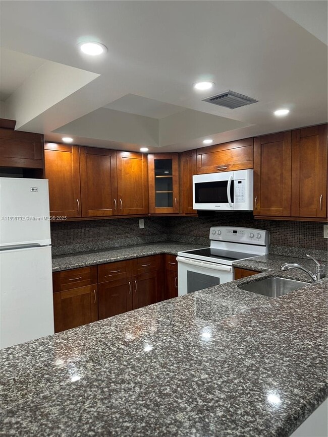 Building Photo - 9010 SW 125th Ave Unit G102