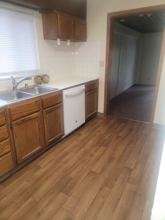 Photo - University Place 4 bedroom, 2 bath. Partially fenced yard