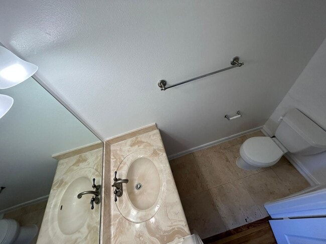 Photo - 2 Bedroom 1.5 Bath Townhome. Gated Community. Upgraded & 2 Parking Spaces