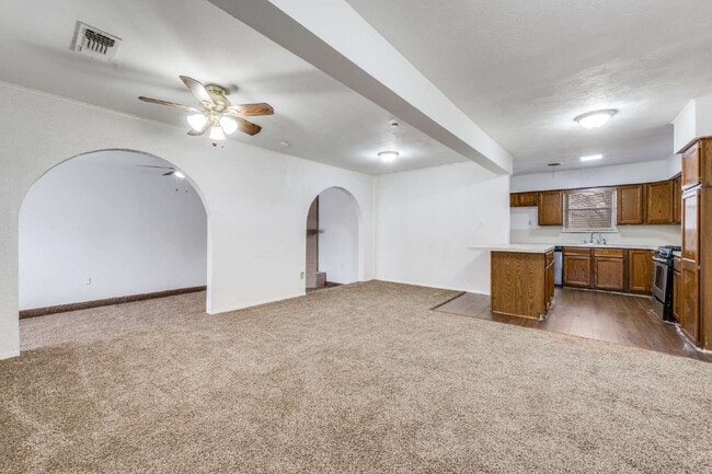 Photo - Spacious 4-Bed, 2-Bath Home with Two Living Areas and Huge Shaded Yard – Minutes to UNT/TWU