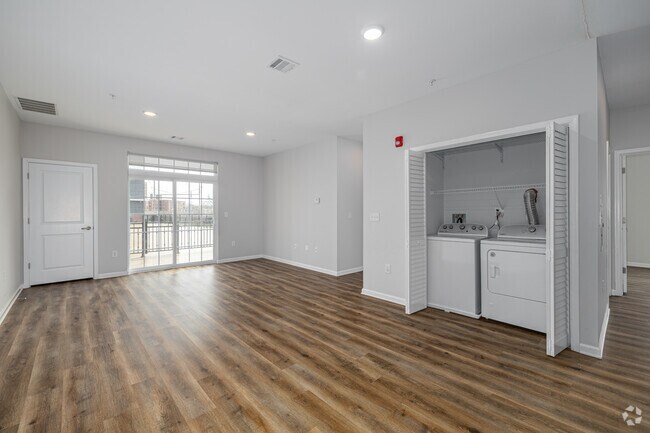 2BR, 2BA - 1,010SF - Living Room/Laundry