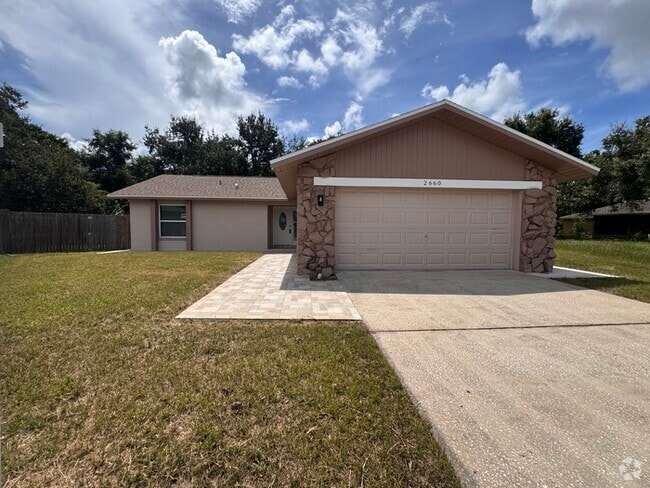 Building Photo - Fully Renovated Palm Harbor Home