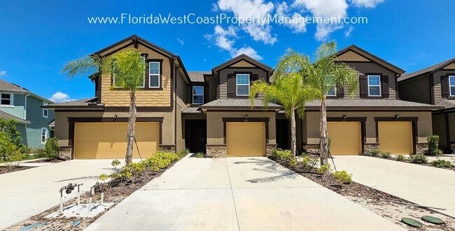 Building Photo - SUPER 3 BEDROOM/2.5 BATH TOWNHOME AVAILABLE IN HARMONY! TERRIFIC LWR LOCATION!
