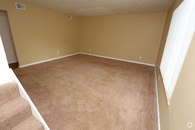 3BR, 1.5 BA - 1,00 SF - Living Room - The Oaks at St Andrews