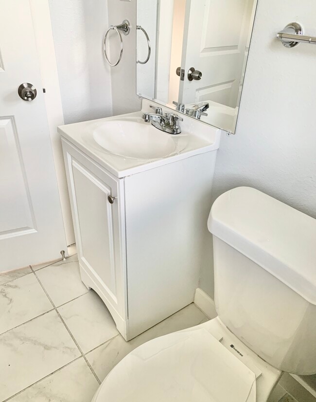 All new toilet and vanity sink - 2620 Tuam St Unit 2
