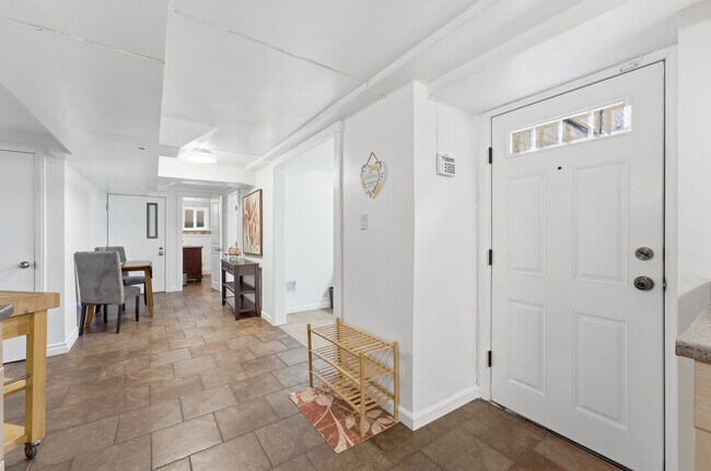 Entry and view of the part of the apartment - 1515 Arboretum Pl E Unit MIL