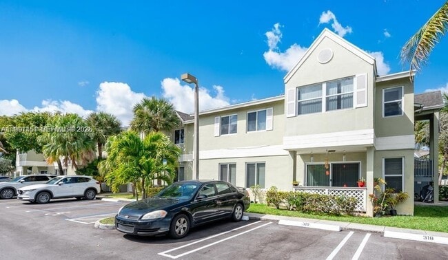 Building Photo - 17500 NW 67th Pl Unit F-4