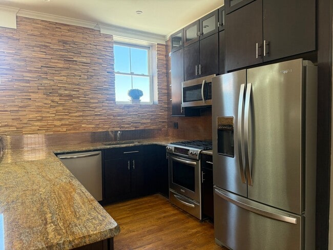 Photo - Completely Renovated Downtown Memphis Loft with Rooftop Skyline Views.