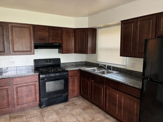 Photo - Spacious Updated 4 Bed 2 Bath with Garage Parking