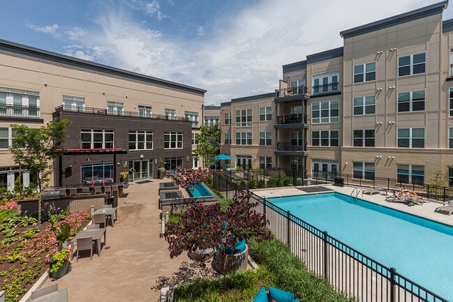 Our resort-style swimming pool features a sundeck and cabanas - Mallory Square Rental