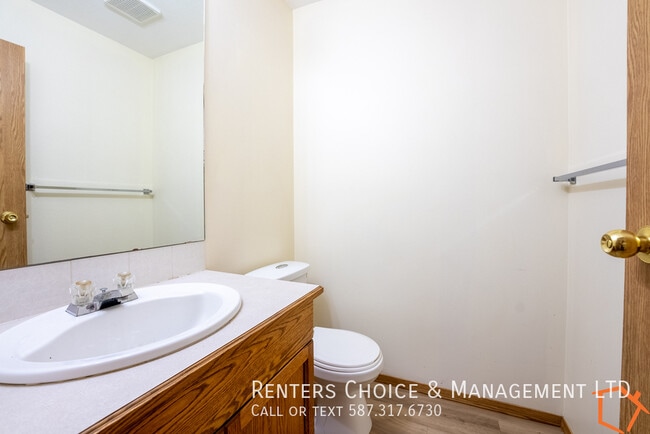 Photo - Easy Walk to Downtown Amenities, Assigned Parking, Spacious Townhouse