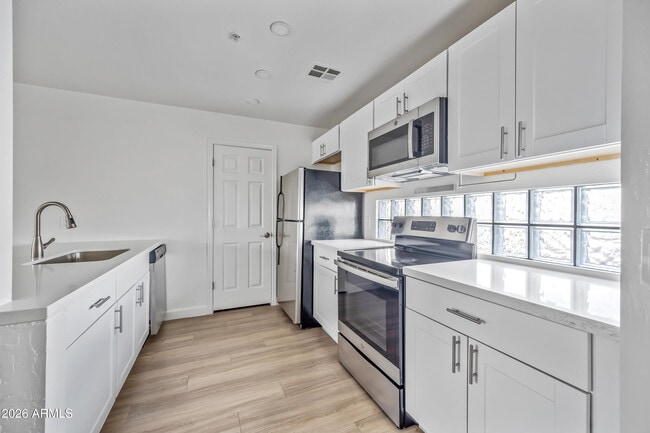 Building Photo - 3065 N 67th Ave Unit 138