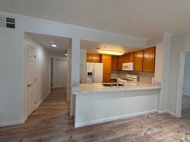 Photo - 2 bed | 2bath | 1039 SF | Private Garage | Assigned Parking | Owners pays for WS&G!