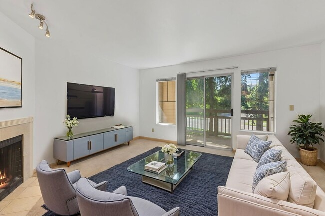 Photo - 2 level condo, 3 decks, Stainless Appliances, 2 parking spots, Water, sewer, garbage included!