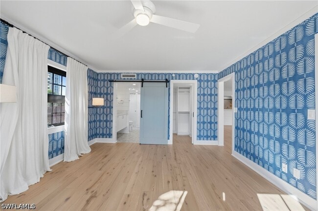 Building Photo - 6080 Pelican Bay Blvd Unit 205A