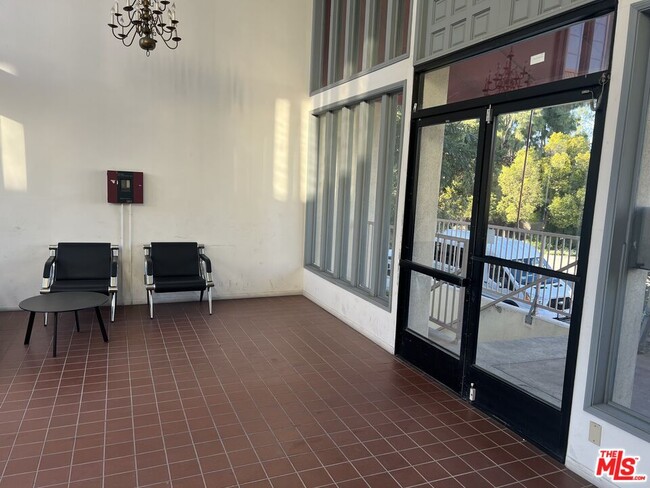 Photo - 18640 Collins St Unit 216