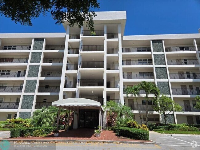 Building Photo - 2850 N Palm Aire Dr Unit 104 Rental