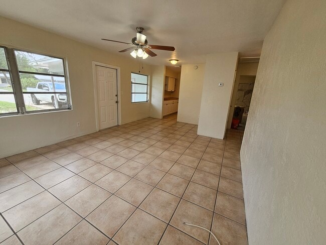 Living looking @ carport - 173 38th Ave SE Unit 173