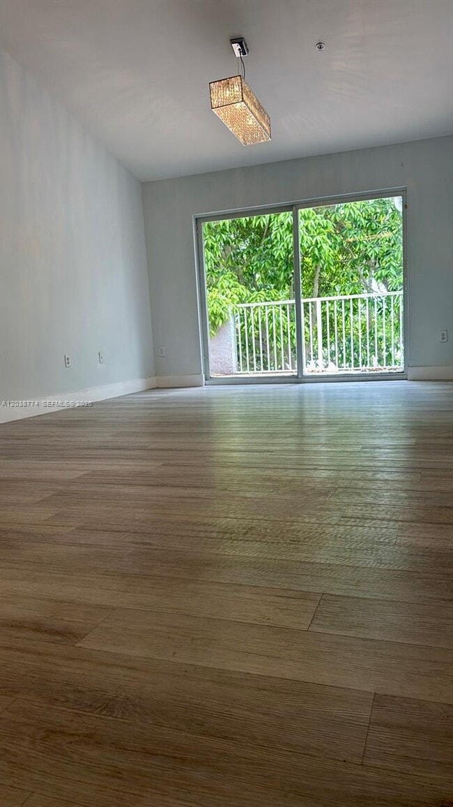 Building Photo - 11155 SW 5th Pl Unit 302