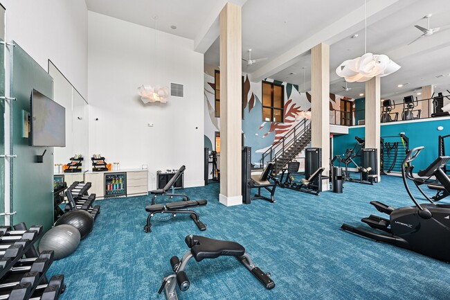 Two-Story Fitness Center with Strength, Cardio + Resistance Training