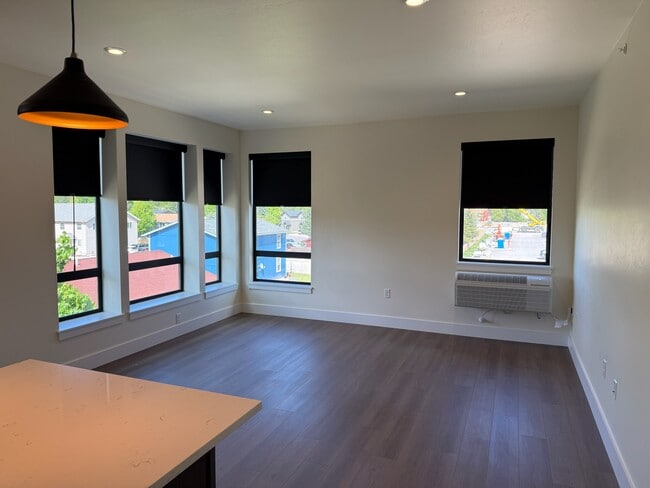 This home now has carpet instead of hardwood - 105 Colorado Ave Unit 102