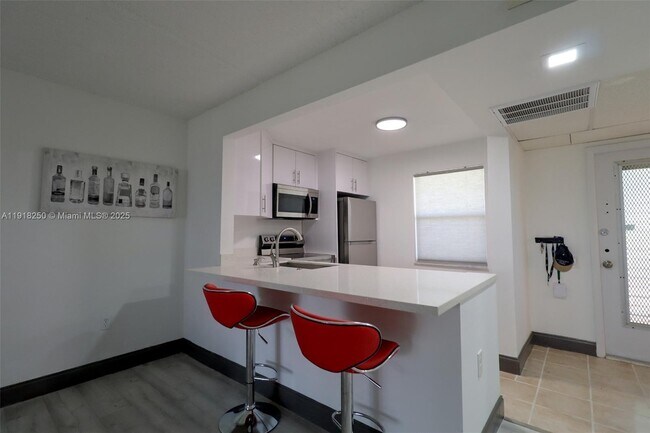 Photo - 9300 Lime Bay Blvd Unit 102