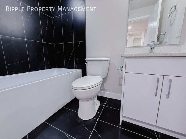 NEWLY RENOVATED 4 BEDS, 1 BATHS LOWER UNIT