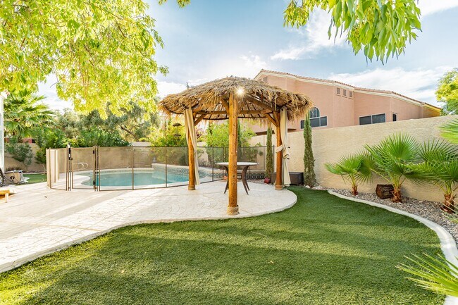 There's a baby fence around the pool, but we can remove that if you don't have children. - 8600 Mirada del Sol Dr