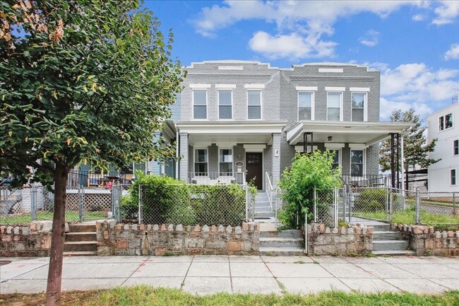 Building Photo - Modern 4BR Home w/ Fireplace, In-Law Suite + Parking in Prime DC Location!