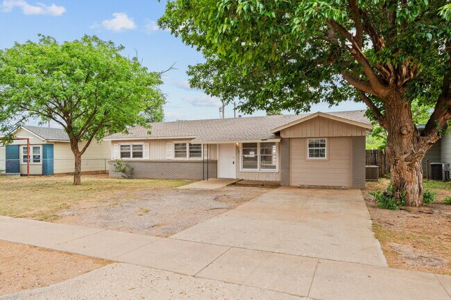 Photo - Updated Home with Gorgeous Floors & Large Backyard