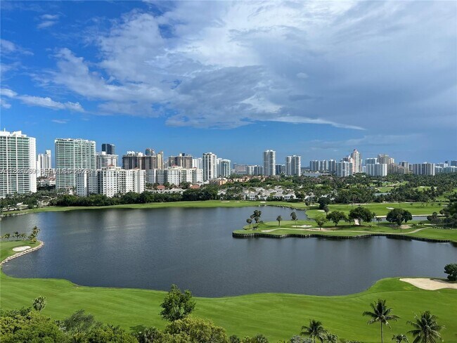 Building Photo - 3625 N Country Club Dr Unit 1908