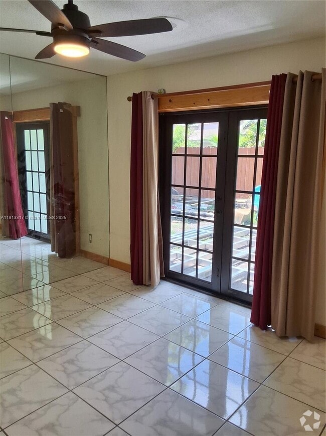 Building Photo - 8575 NW 26th Dr Rental