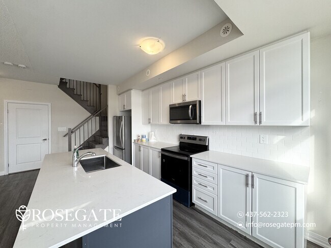 Photo - Modern 2-Bedroom Stacked Townhouse with Balcony & Parking in Milton Unit 121