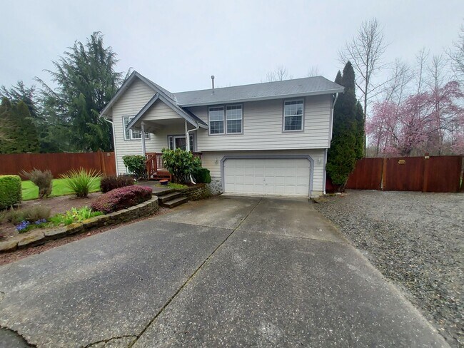 Photo - 4 bedroom 2.75 bath, Huge Fenced Yard with Landscaping Included!!