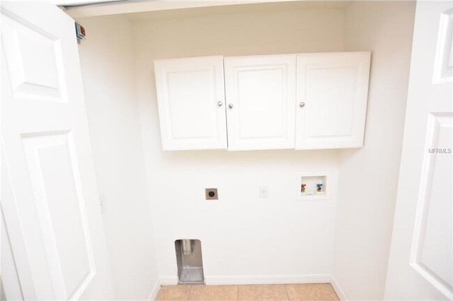 Upstairs laundry closet - 5341 River Rock Rd Townhome