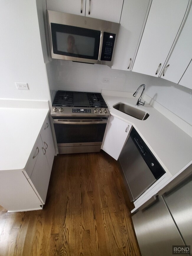 Building Photo - 145 E 16th St Unit 8A Rental