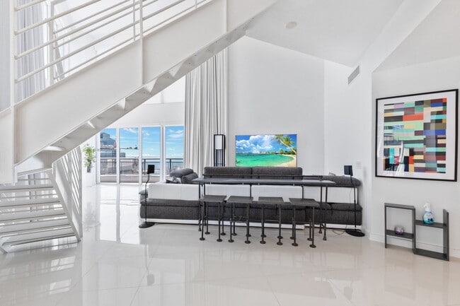 Photo - Stunning two-level 3 bedroom 4 bath corner unit with breathtaking panoramic views in center of Do...