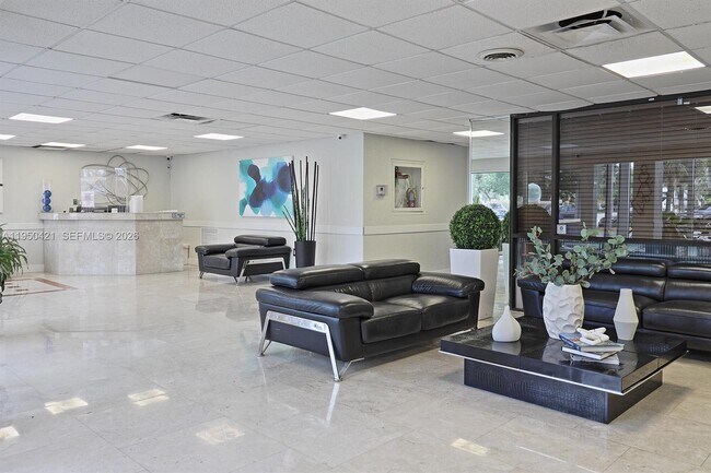 Building Photo - 7904 West Dr Unit 306