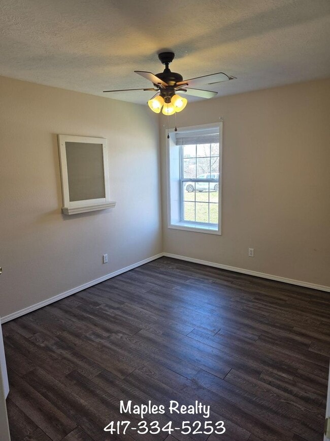 Photo - 3 Bed | 2 Bath Home in Hollister, MO – Flat Yard + 2-Car Garage